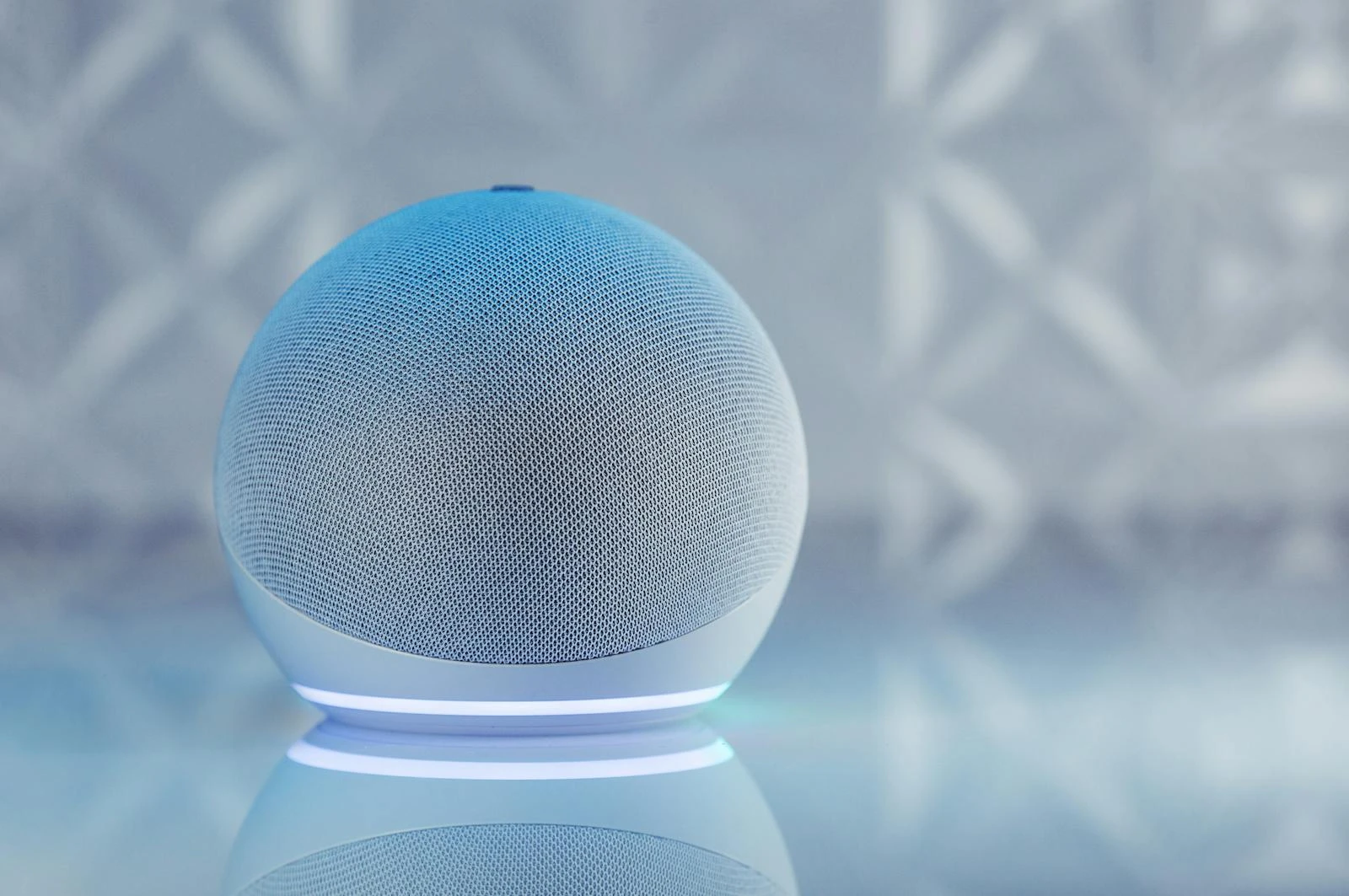 Person using voice search on a smartphone representing voice SEO, SpeakableSpecification schema, and AI assistant optimization