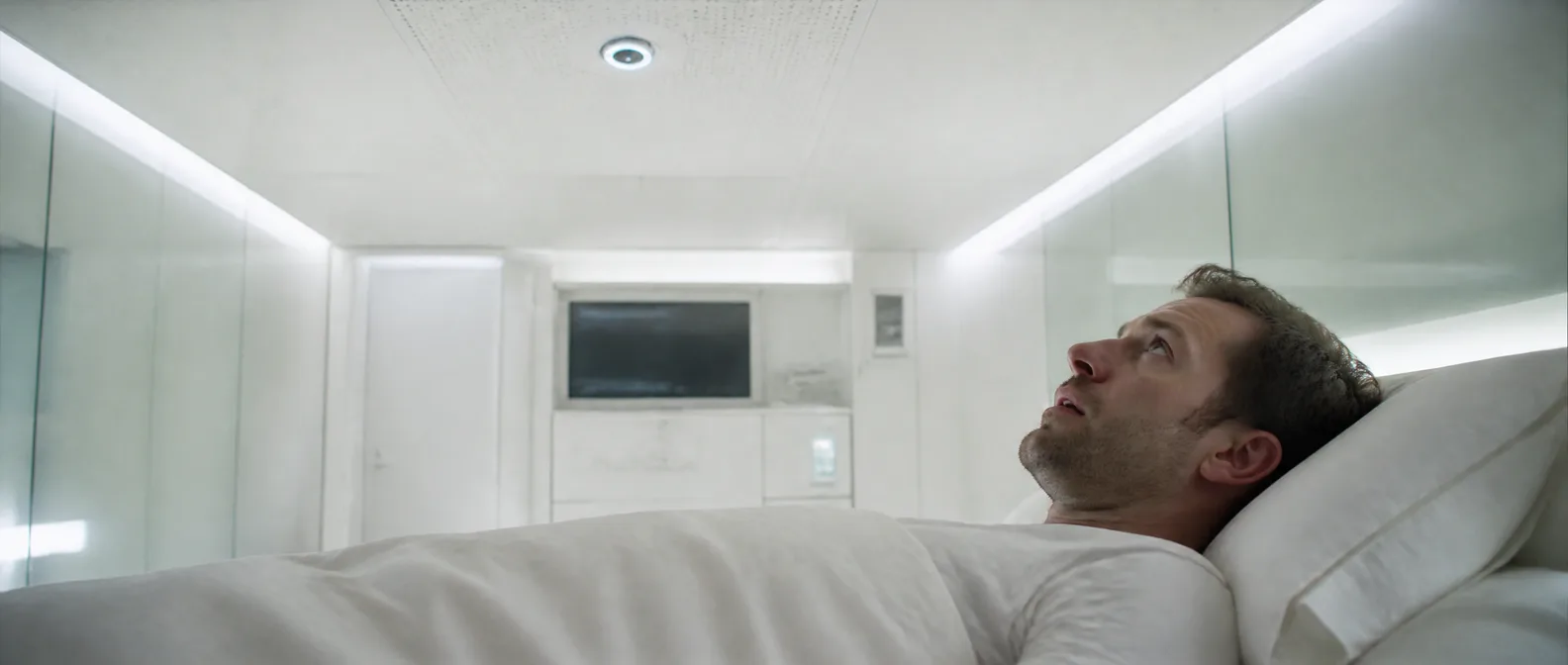 A man waking beneath a white acoustic ceiling watched by a single embedded camera, crushed by a nameless guilt — The Guilt Horizon, Chapter One