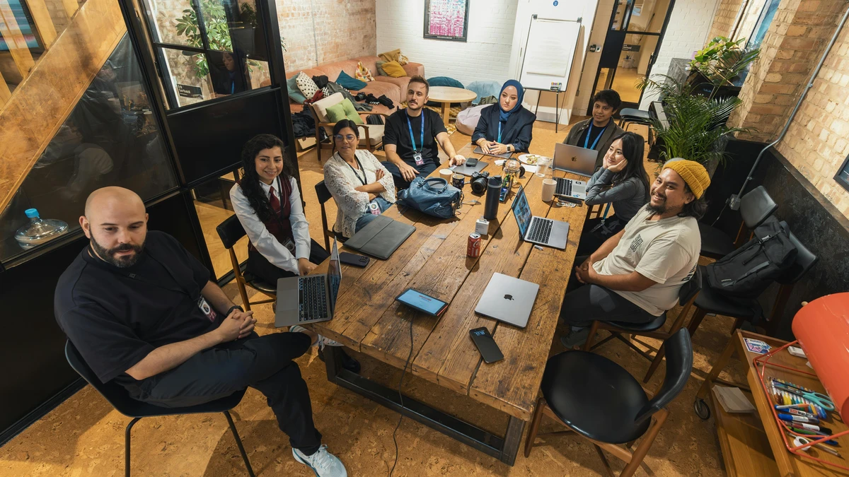 Digital Marketing Co. team collaborating on a strategic marketing campaign in a modern office environment