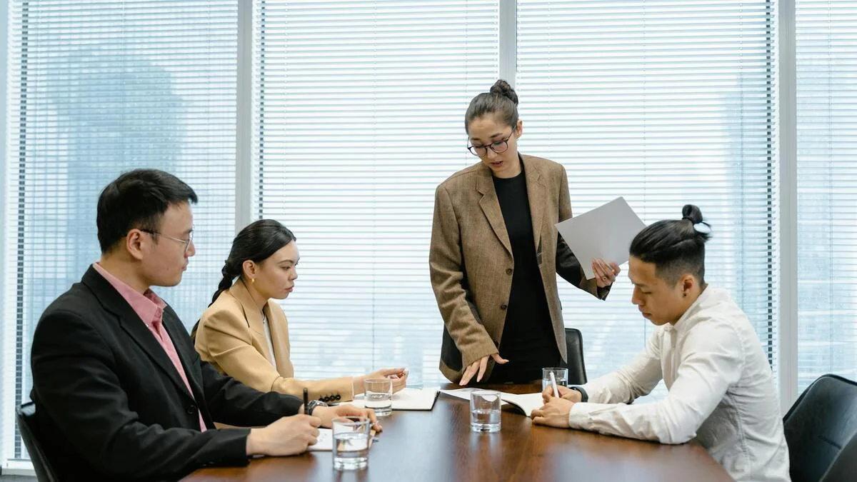 Digital marketing team planning press release distribution strategy